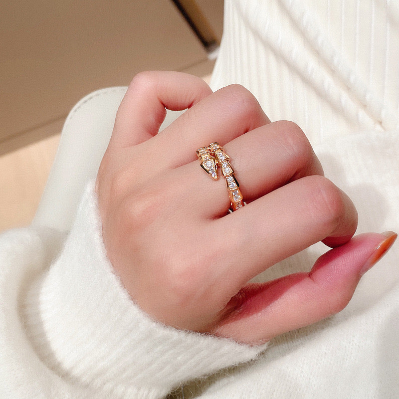 Snake bone ring with diamonds