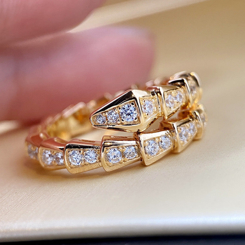 Snake bone ring with diamonds