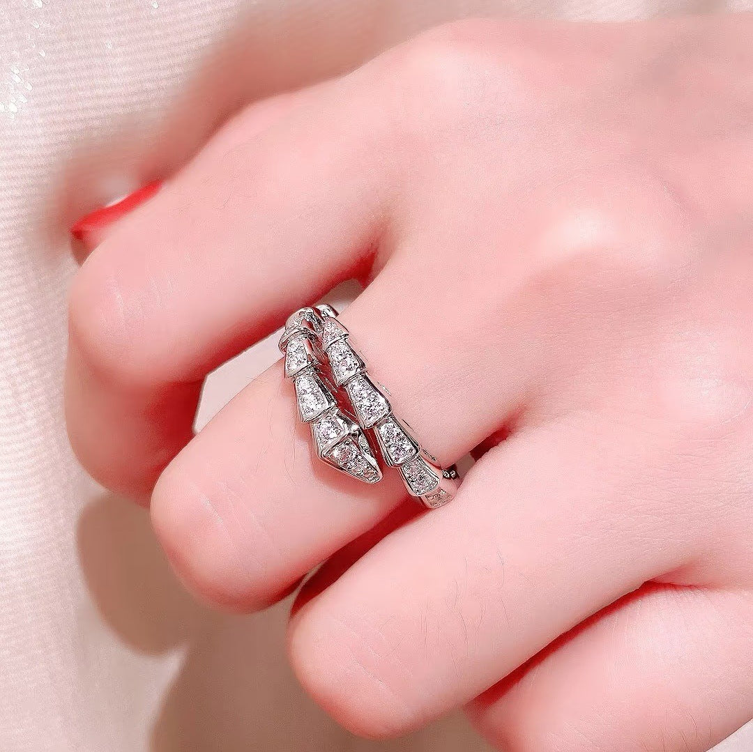 Snake bone ring with diamonds
