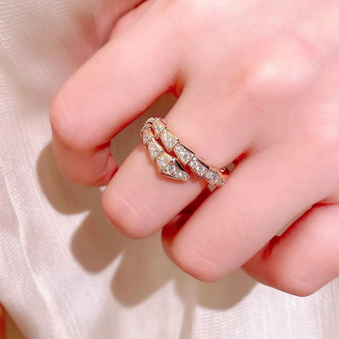 Snake bone ring with diamonds