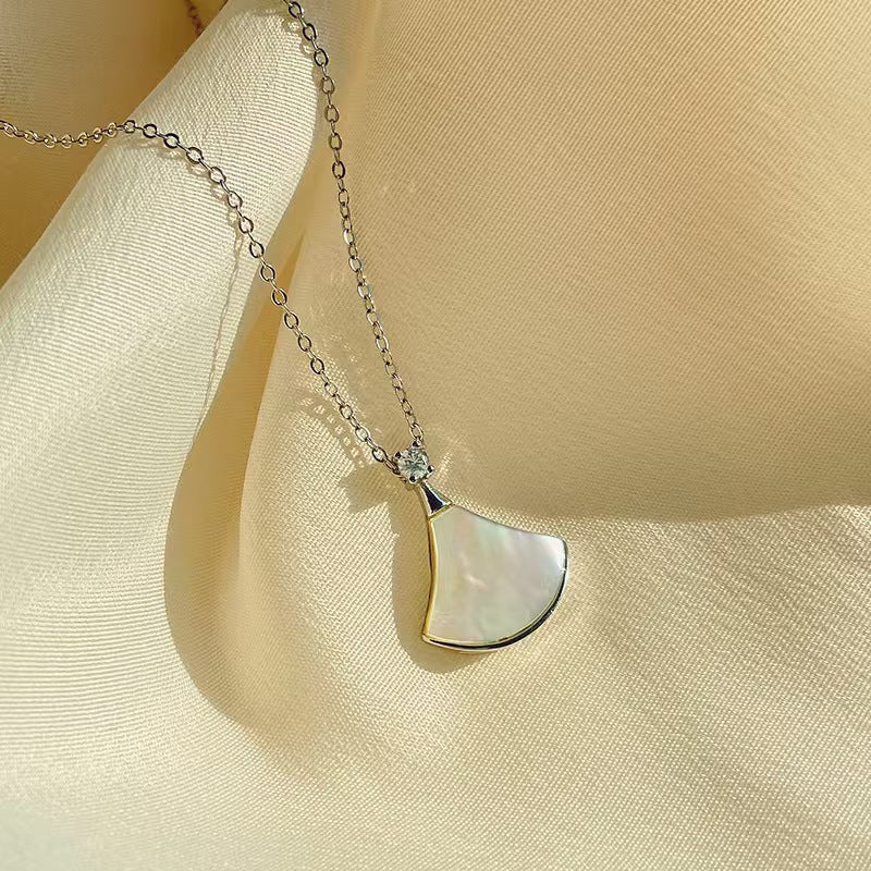 Shell skirt pendant necklace