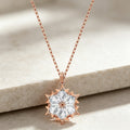 Crystal Snowflake Pendant Necklace in Rose Gold Tone