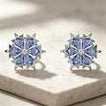 Blue Crystal Snowflake Stud Earrings in Silver Tone