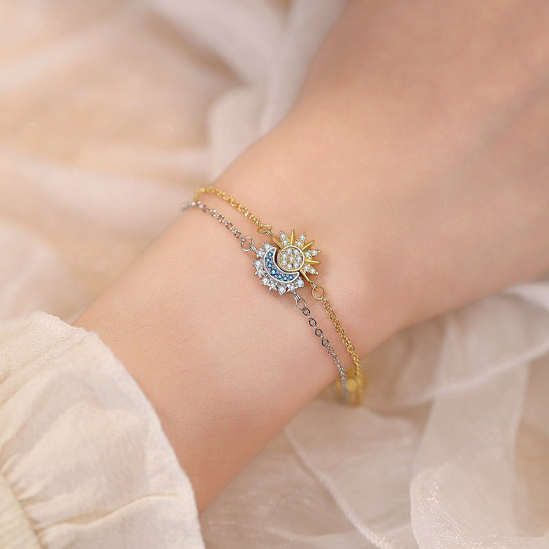 Sun and moon zircon bracelet set worn on a wrist