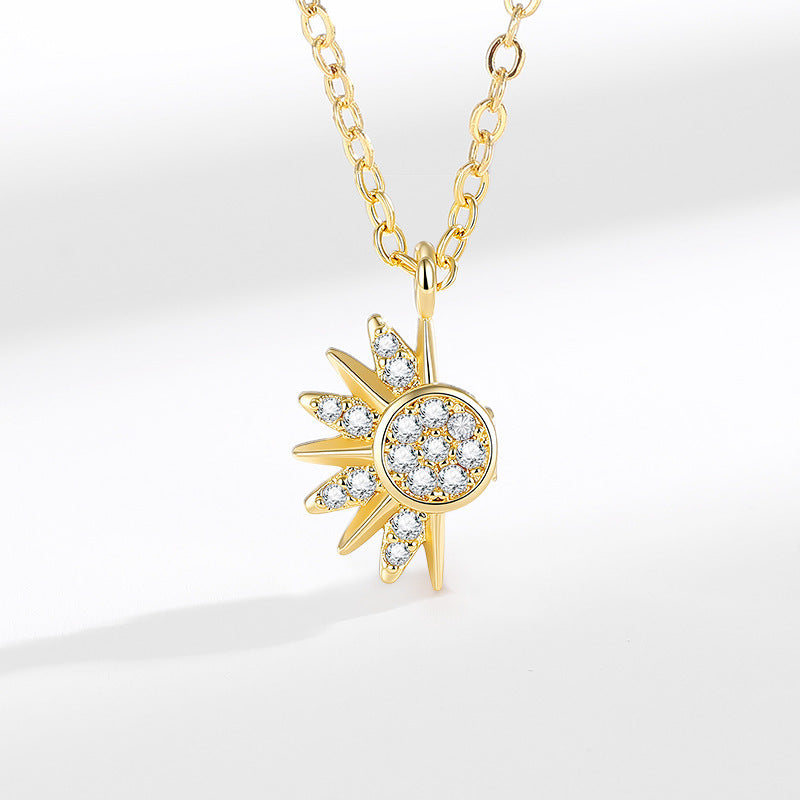 Gold-tone magnetic sun pendant necklace with cubic zirconia accents