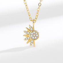 Gold-tone magnetic sun pendant necklace with cubic zirconia accents