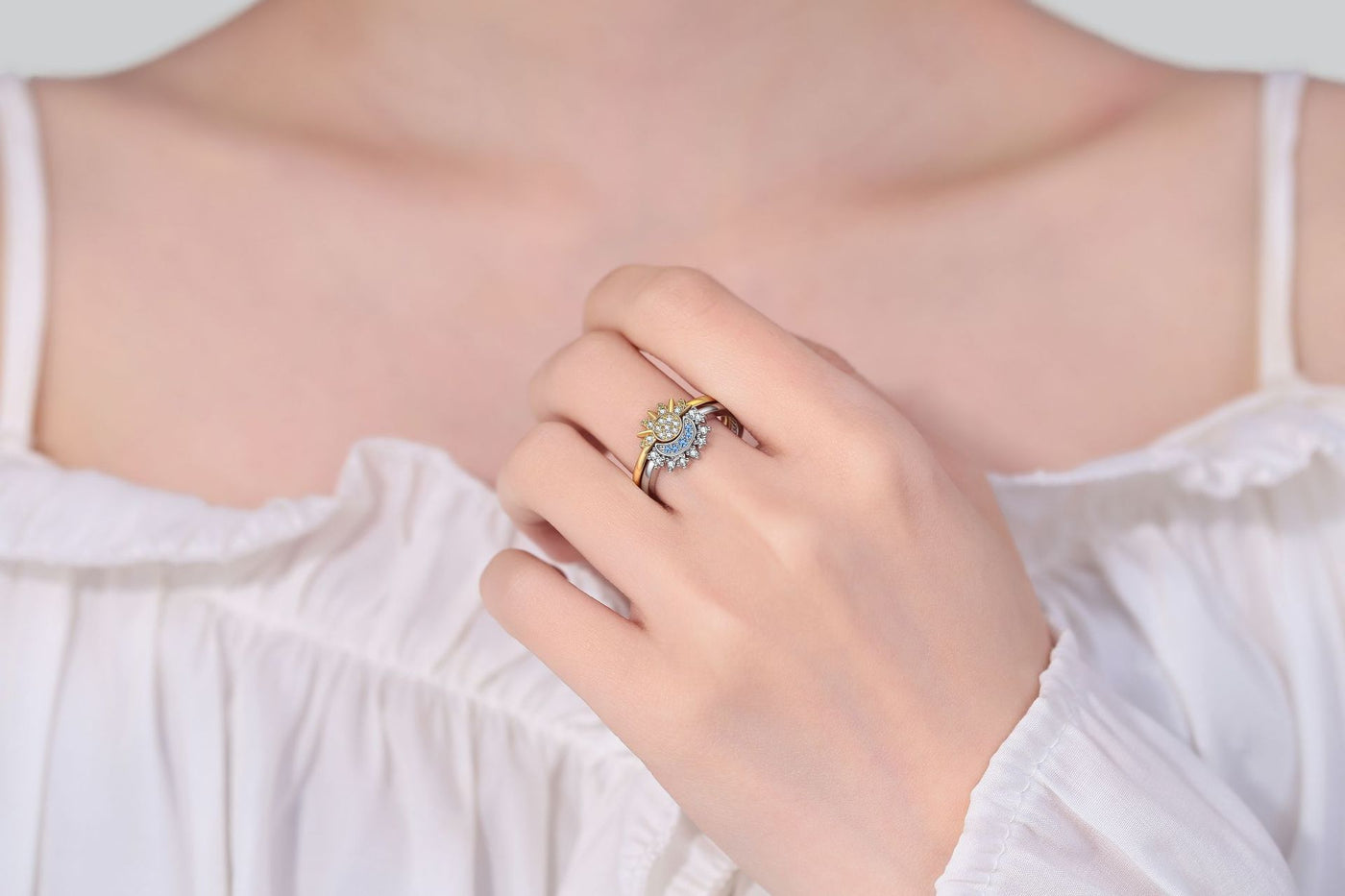 Model wearing sun and moon adjustable open rings