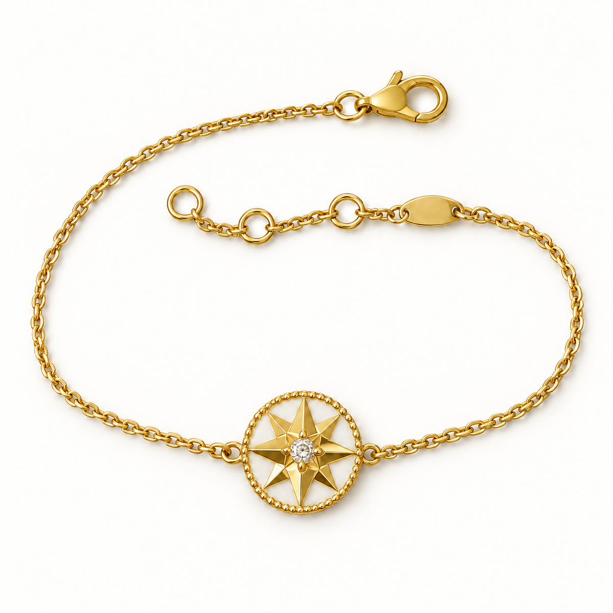 Gold-tone white-inlay eight-point compass star bracelet with lobster clasp and extender