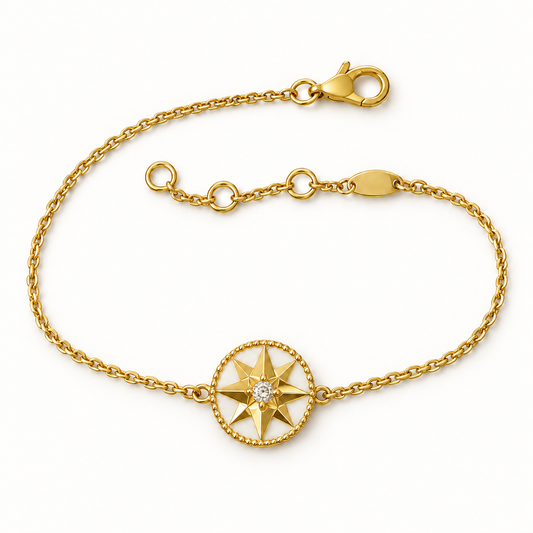 Gold-tone white-inlay eight-point compass star bracelet with lobster clasp and extender