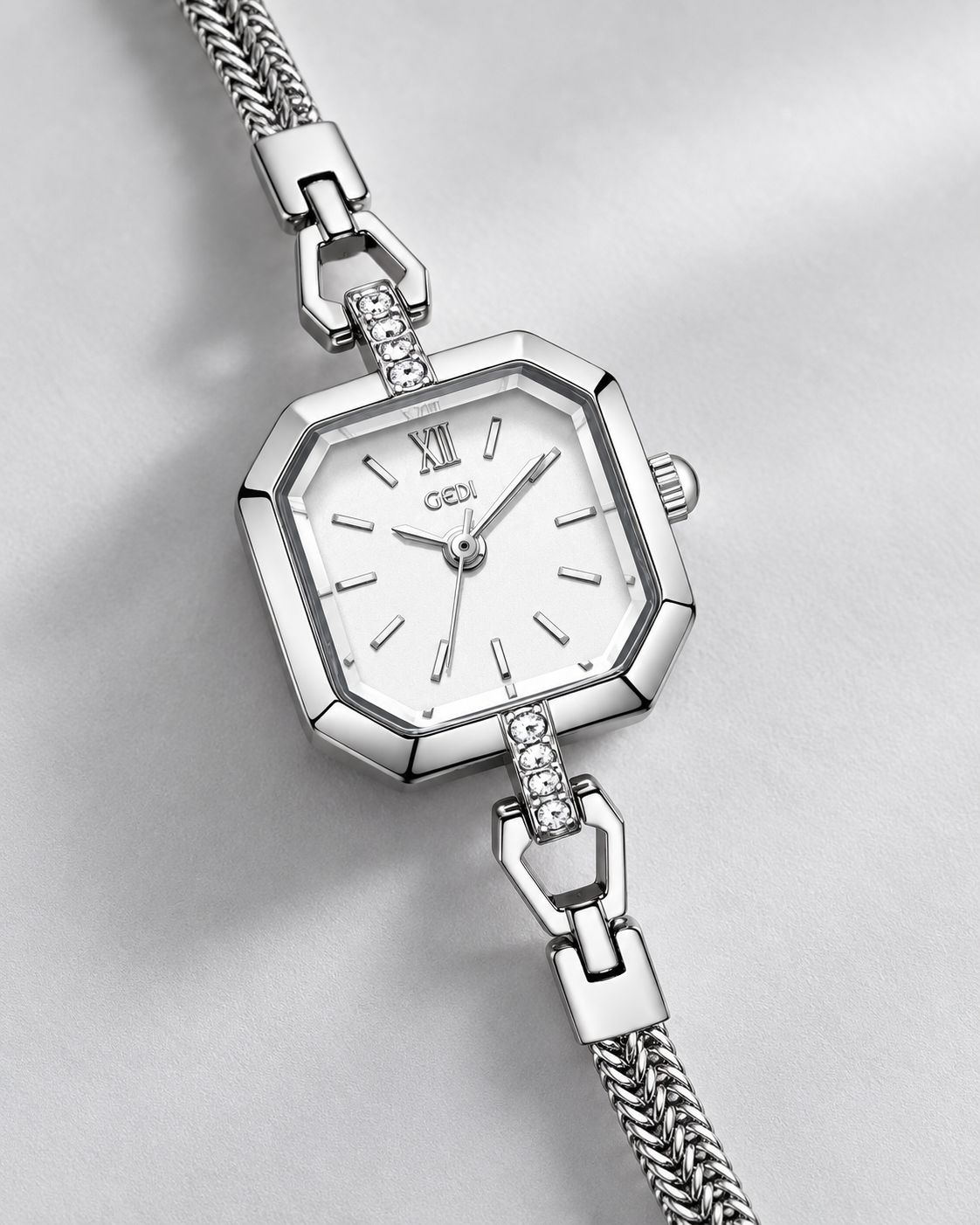 Silver-tone GEDI octagonal bracelet watch with white dial, Roman XII marker and clear stone-set connectors