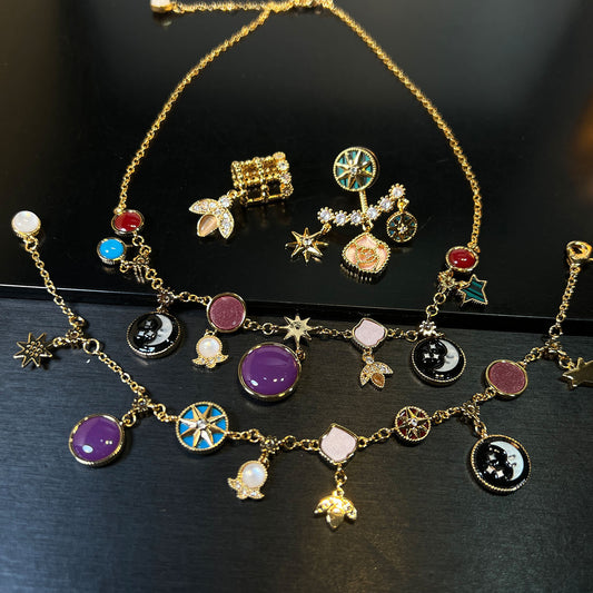 Gold-tone celestial charm necklace bracelet and earrings full set