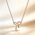 Pavé Bow Pendant Necklace in Rose Gold Tone