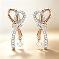 Pavé Bow Drop Earrings in Rose Gold Tone