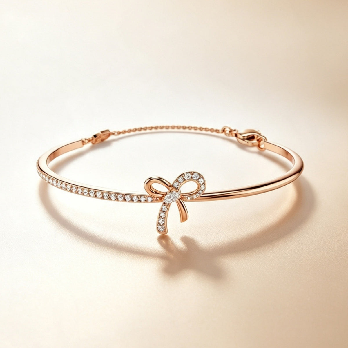 Pavé Bow Bangle Bracelet - Rose Gold Tone with clear zircon accents