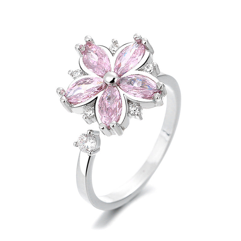 Pink Blossom Spinner Ring with an open band
