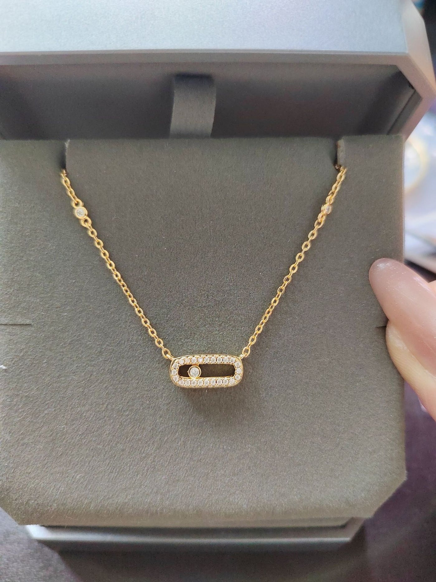 Gold-tone pavé open link necklace with sliding stone