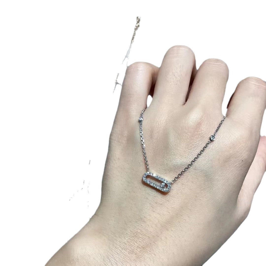 Silver-tone pavé open link necklace on a clean background