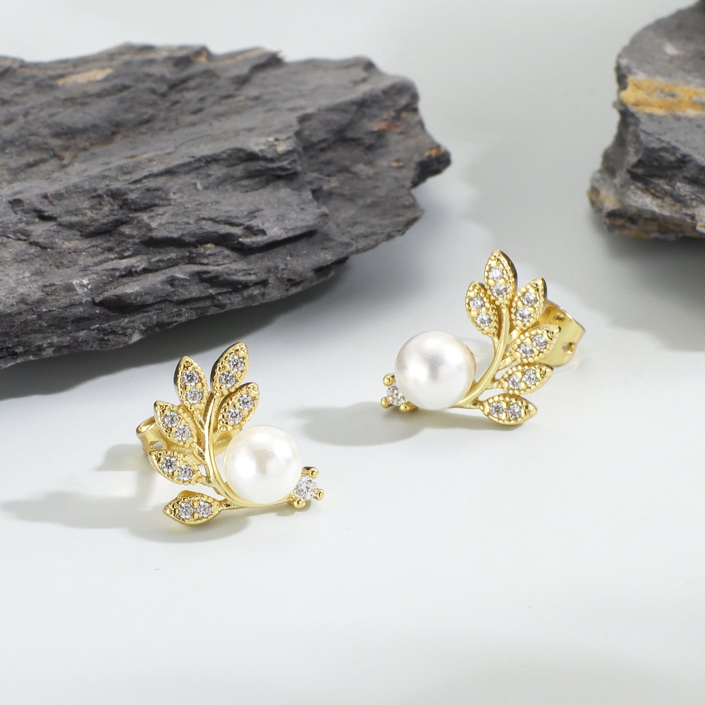 Olive leaf pearl stud earrings with diamonds