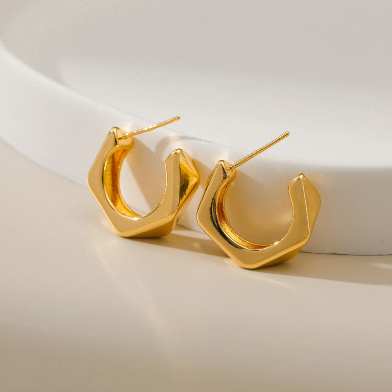 Boucles d'oreilles lisses et irrégulières 