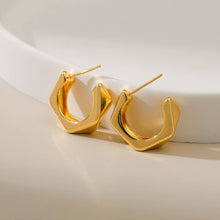 Boucles d'oreilles lisses et irrégulières 