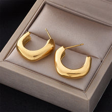 Boucles d'oreilles géométriques en forme de U 