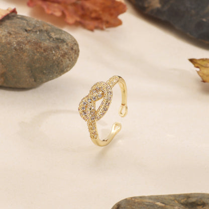 Chain knotted diamond ring