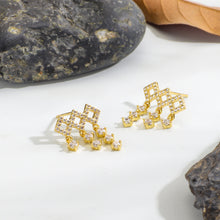 Boucles d'oreilles à pampilles géométriques en diamant 