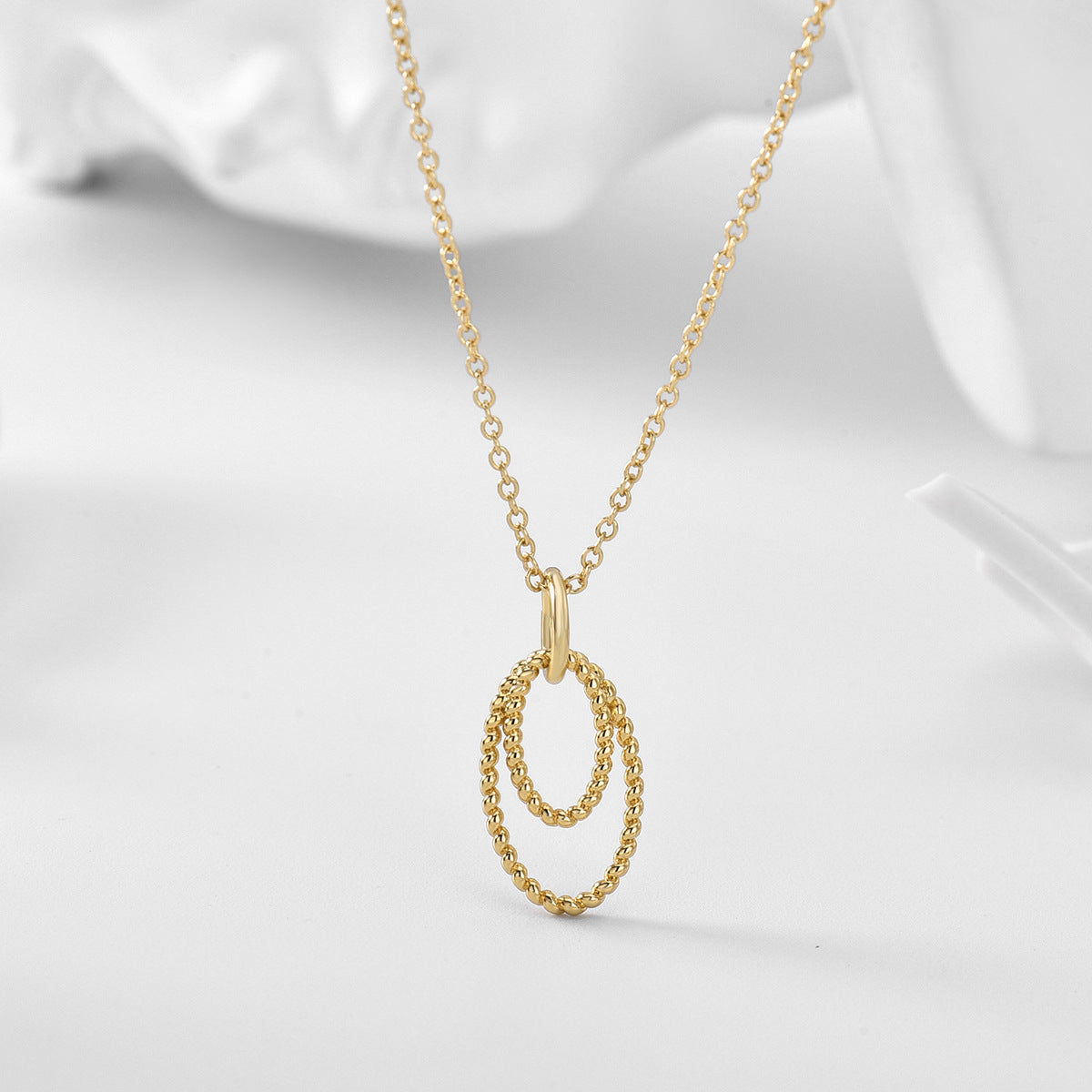 Collier simple pop à double anneau 
