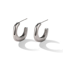 Boucles d'oreilles géométriques en forme de U 