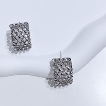 Boucles d'oreilles géométriques en maille creuse 