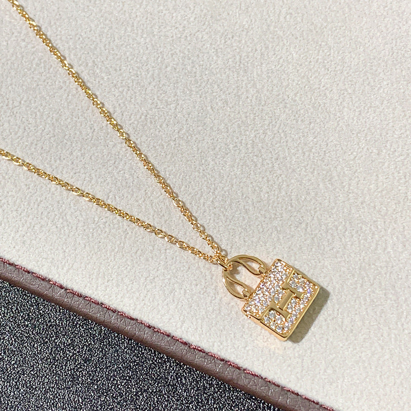 Iconic Mini Handbag Pendant – Chic Purse Charm Necklace, 18K Gold Plated