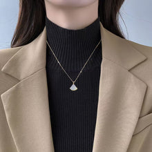 Shell skirt pendant necklace