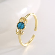 Bague queue de lune turquoise sertie 
