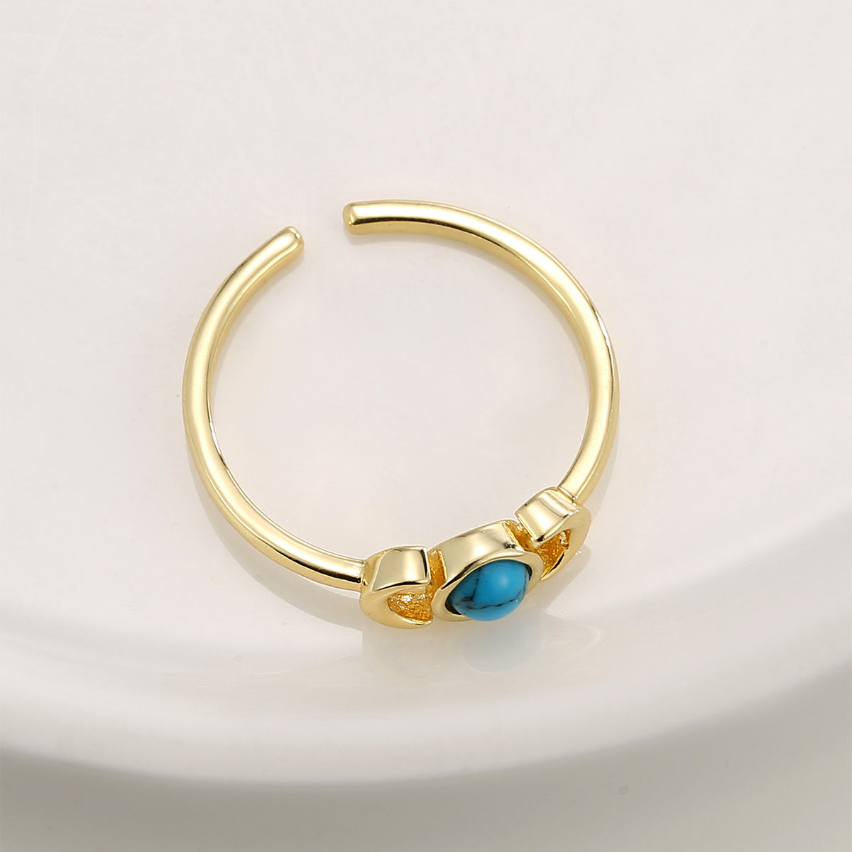 Bague queue de lune turquoise sertie 