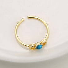 Bague queue de lune turquoise sertie 