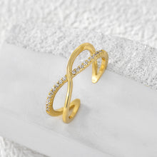 Bague en diamant sertie d'une croix 