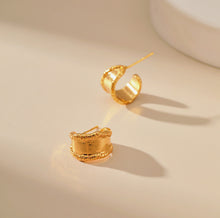 Boucles d'oreilles créoles irrégulières à larges bords 