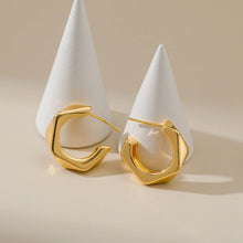 Boucles d'oreilles lisses et irrégulières 