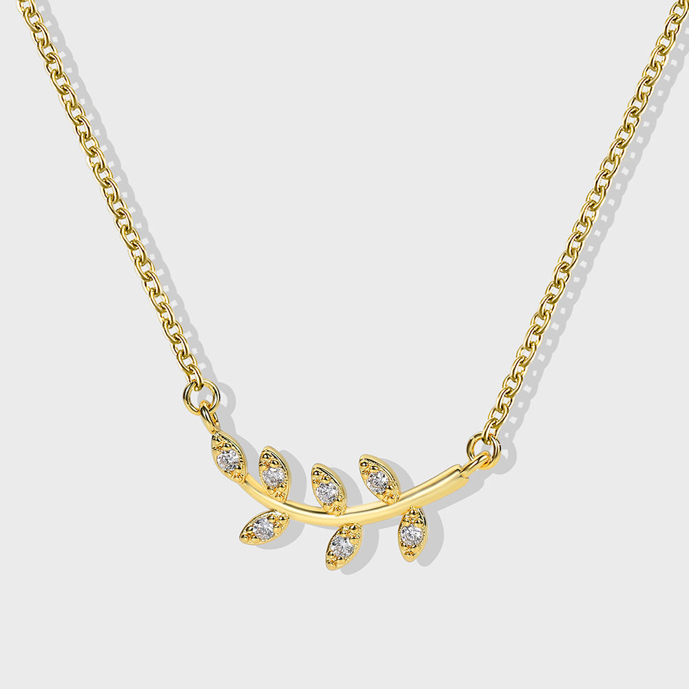 Collier branche d'olivier et feuille incrusté de diamants 