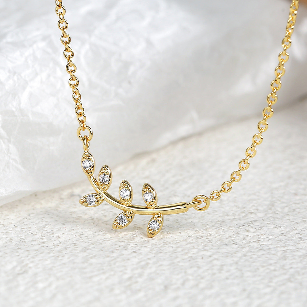 Collier branche d'olivier et feuille incrusté de diamants 