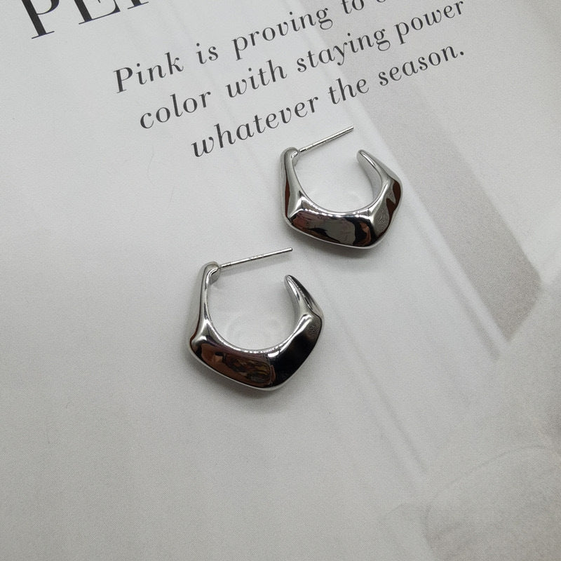 Boucles d'oreilles irrégulières en forme de C 