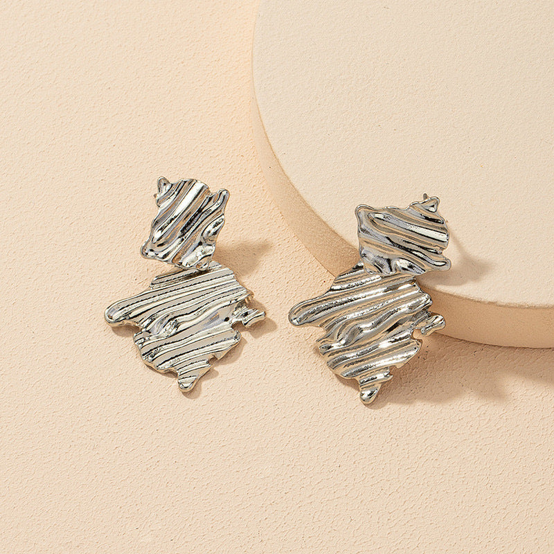 Clou d'oreille à texture pliée géométrique 