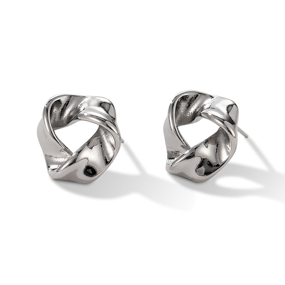 Boucles d'oreilles creuses torsadées 