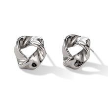 Boucles d'oreilles creuses torsadées 
