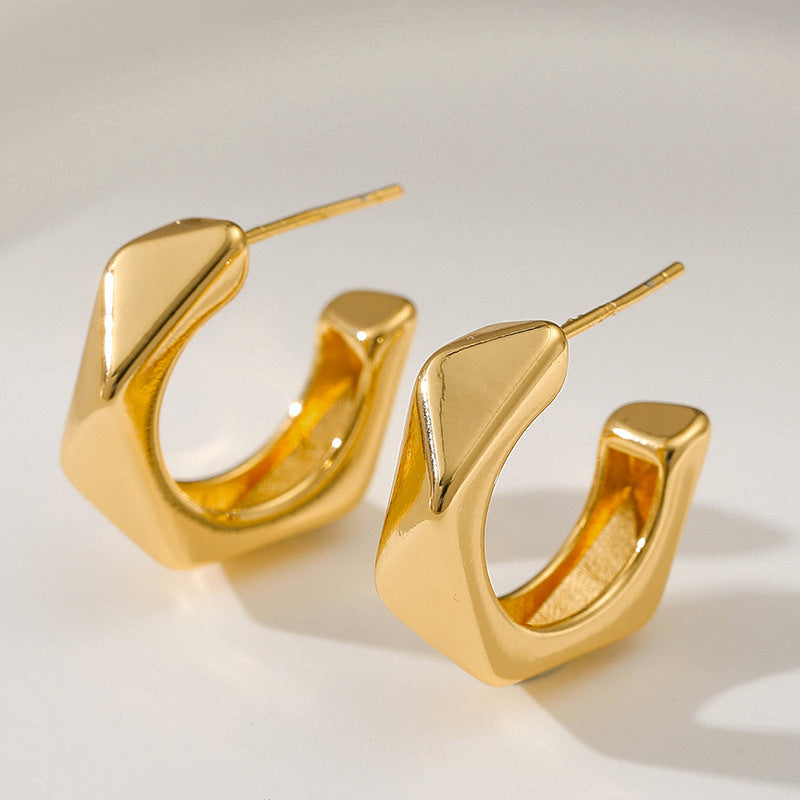 Boucles d'oreilles lisses et irrégulières 