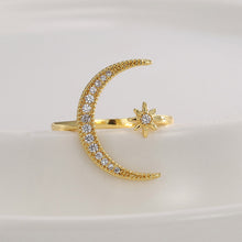 Crescent diamond-encrusted open tail ring