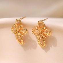 Boucles d'oreilles tressées créatives à fleurs creuses 