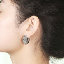 Boucles d'oreilles rondes géométriques 