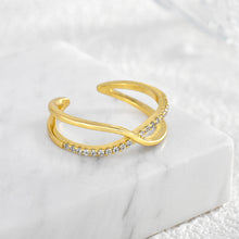 Bague en diamant sertie d'une croix 