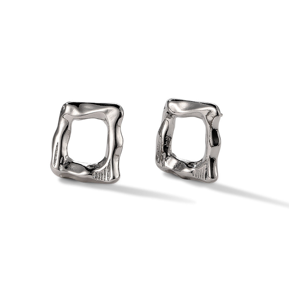 Clous d'oreilles carrés irréguliers 